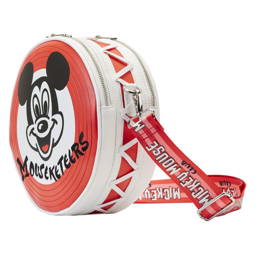 Side view of the Mickey Mouse Mouseketeer crossbody bag, the bag is in the shape of Mickey's drum.